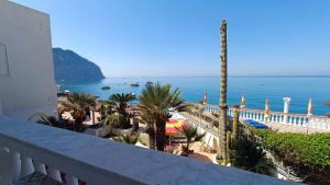 a balcony with a view of the ocean at Casa del Mare in Ischia