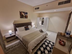 Φωτογραφία από το άλμπουμ του king Deluxe Rooms in a shared apartment with Shared bathroom σε Sharjah
