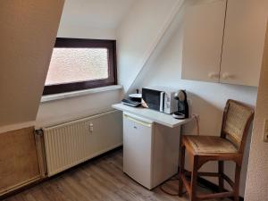 O bucătărie sau chicinetă la City- und Messeapartment Hildesheim