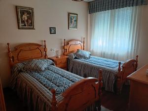 Кровать или кровати в номере La Casa de Ana