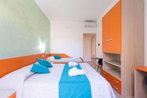 Room & Breakfast Aloe客房内的一张或多张床位