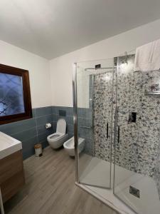 Koupelna v ubytování Zenia Rooms