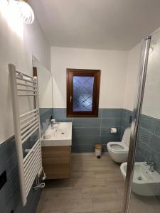 Koupelna v ubytování Zenia Rooms