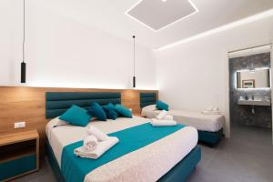 Room & Breakfast Aloe客房内的一张或多张床位