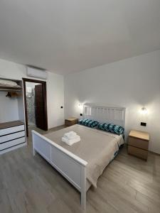 Postel nebo postele na pokoji v ubytování Zenia Rooms