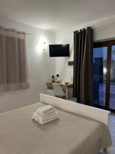 TV a/nebo společenská místnost v ubytování Zenia Rooms