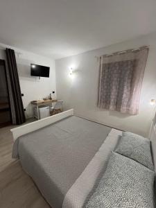 Postel nebo postele na pokoji v ubytování Zenia Rooms