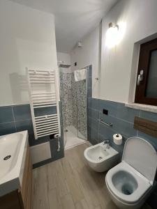 Koupelna v ubytování Zenia Rooms