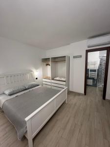 Postel nebo postele na pokoji v ubytování Zenia Rooms