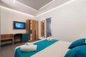 Room & Breakfast Aloe客房内的一张或多张床位