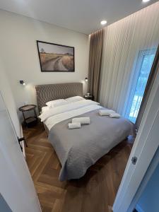 Ένα ή περισσότερα κρεβάτια σε δωμάτιο στο Bajor Lodge - Zvaigdziu Aleja - Kunigiskiai - Self check-in
