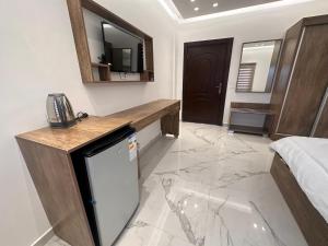 Η κουζίνα ή μικρή κουζίνα στο Petra view apartment