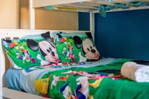 a bunk bed with two dalmatians pillows on it at Resort w Lazy River and Arcade 30mis to Disney in Davenport