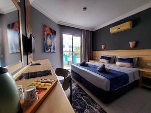Postel nebo postele na pokoji v ubytování Summer rose hotel + 37 fotografií