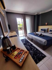 Postel nebo postele na pokoji v ubytování Summer rose hotel