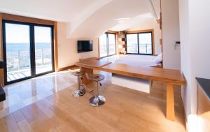Televiisor ja/või meelelahutuskeskus majutusasutuses Villa Tivat Bay View