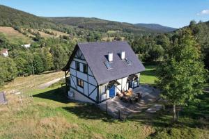 an aerial view of a black and white house at Apartamenty z widokiem in Świeradów-Zdrój