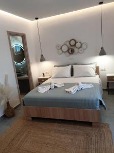 Aetherian Suites客房内的一张或多张床位