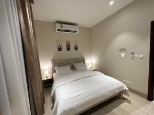 Postelja oz. postelje v sobi nastanitve Wonderful Ground Studio - Hawana Salalah Resort