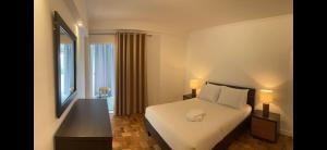 Postel nebo postele na pokoji v ubytování Discovery 1