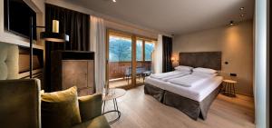 Postel nebo postele na pokoji v ubytování Hotel Valentinerhof + 37 fotografií