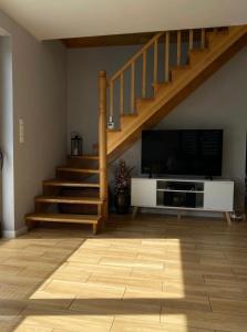 Телевизор и/или развлекательный центр в Dom pod Dębami