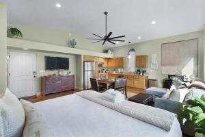a large bedroom with a large bed and a kitchen at Mammoth Rock Retreat Villa-Sleeps 4 in Sedona