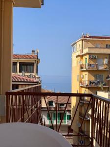 a balcony with a view of some buildings at Porta sul Mare in Tropea