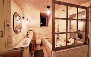 Koupelna v ubytování COSY CHAMBRE-SUITE climatisée