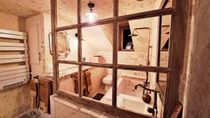 Koupelna v ubytování COSY CHAMBRE-SUITE climatisée