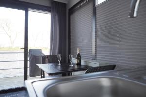 Foto sihtkohas Nieuwpoort asuva majutusasutuse Houseboat Tiny Griffin galeriist