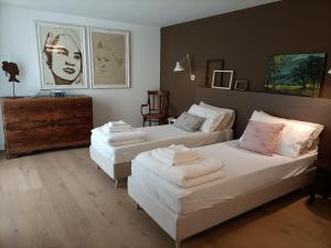 Ένα ή περισσότερα κρεβάτια σε δωμάτιο στο Villa Prince Garda +111 φωτογραφίες