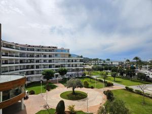 a large white building with a park in front of it at Beach Experience Get-Away! in Trâblous