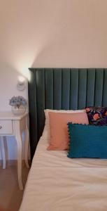 Кровать или кровати в номере Green House