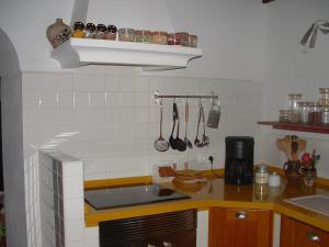 Una cocina o zona de cocina en Ecoland Casa de Campo