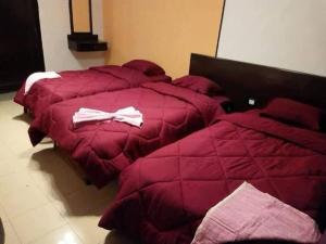 Letto o letti in una camera di Al Waha Hostel