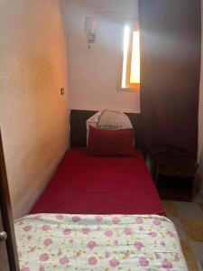 Letto o letti in una camera di Al Waha Hostel