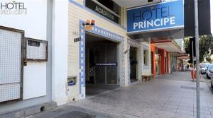 a building with a hotel entrance on a street at HOTEL PRINCIPE in Governador Valadares