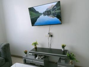 A television and/or entertainment centre at Happy homes
