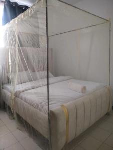 A bed or beds in a room at Happy homes