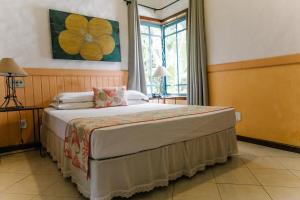 Postel nebo postele na pokoji v ubytování Pousada Burundanga