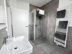 Ett badrum på Reinisch Apartments