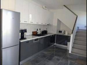 Kuchyň nebo kuchyňský kout v ubytování Luxury house Andrijana