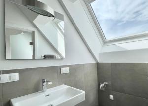 Ένα μπάνιο στο Reinisch Apartments