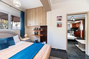 Katil atau katil-katil dalam bilik di Sun & Waves Beachfront Suite