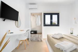 Postel nebo postele na pokoji v ubytování Electra Suites & Spa