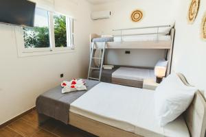 Ένα ή περισσότερα κρεβάτια σε δωμάτιο στο Casa Zoe Luxurious Retreat +26 φωτογραφίες