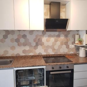 Kuchyňa alebo kuchynka v ubytovaní La Zenia Holiday Home