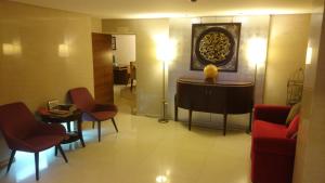 Χώρος καθιστικού στο Delight Hotel