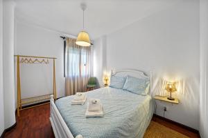 Postel nebo postele na pokoji v ubytování Ombak Apúlia - Sea view